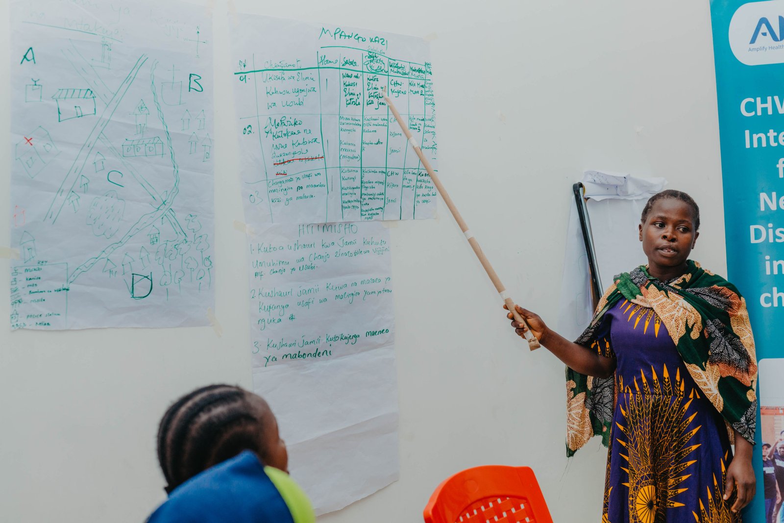 Community health participant presenting an action plan